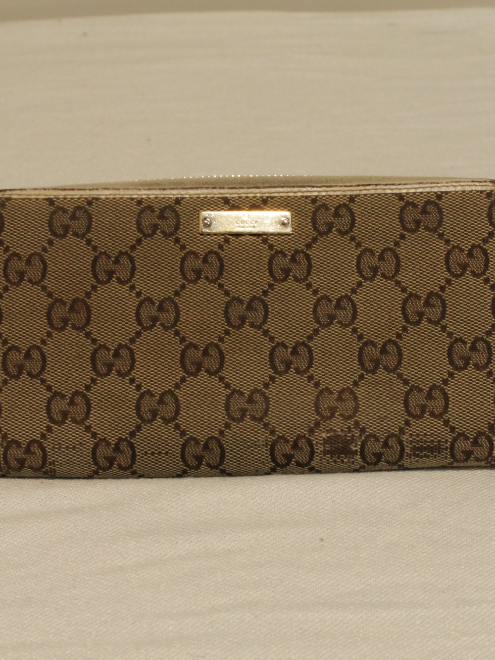 Gucci Brown Signature Canvas Zip Wallet